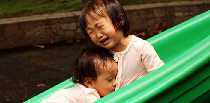 Razor blades found taped to slides in children's public playground