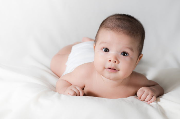 The Development at 2 Months Old,  Your Baby Can Smile & Interact!