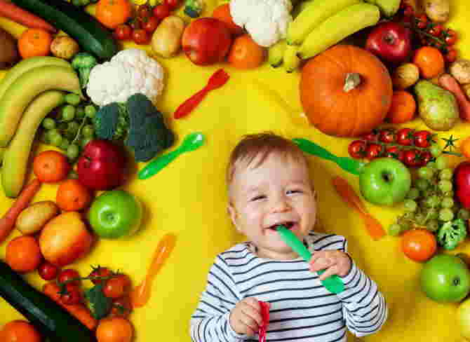 kid with vegetables 